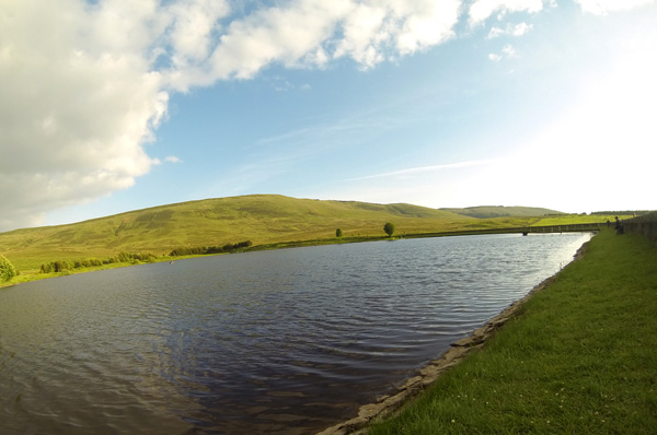 Fishing the dam wall at Tinto Trout Fishery